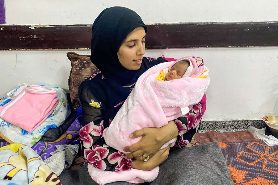 Nai palestina con neno recen nacido